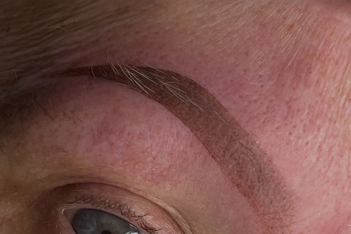 Close-up of a healed powder brow after a colour refresh.